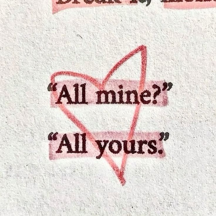 A paper heart around the words All mine? All yours.