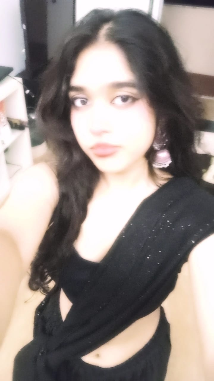 Zoya in a black outfit